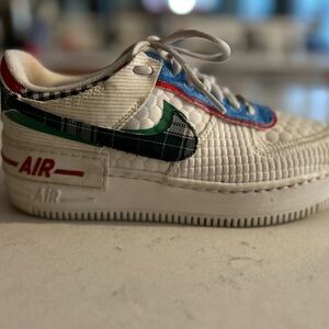 Nike Air Force Ones with Red, Blue, and Green Accents
